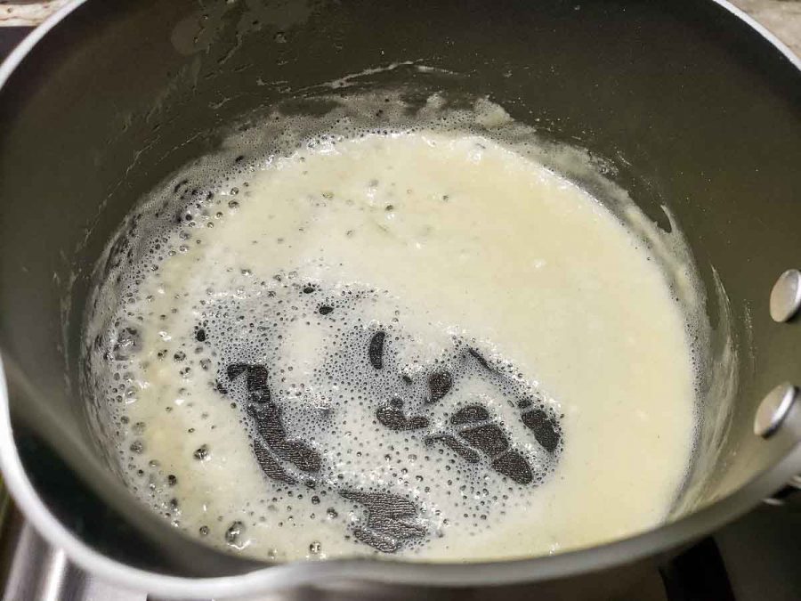 flour and butter making a roux in a pan