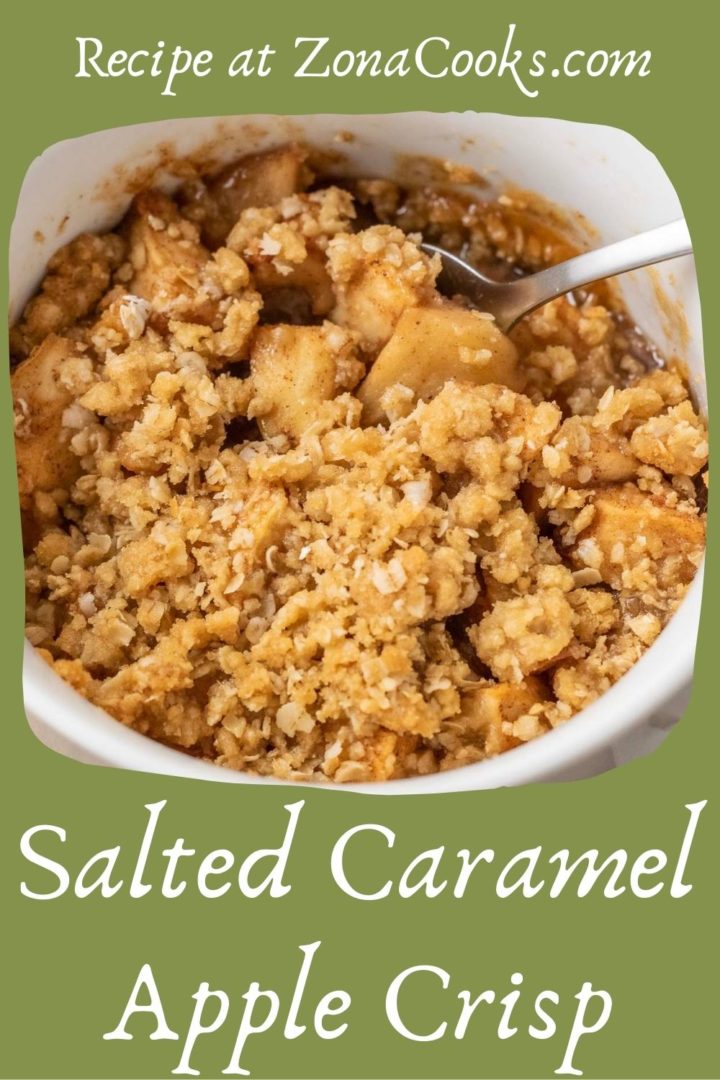 best Salted Caramel Apple Crispin a dish with a spoon.