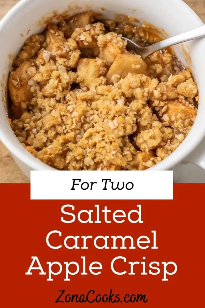 best Salted Caramel Apple Crispin a dish with a spoon.