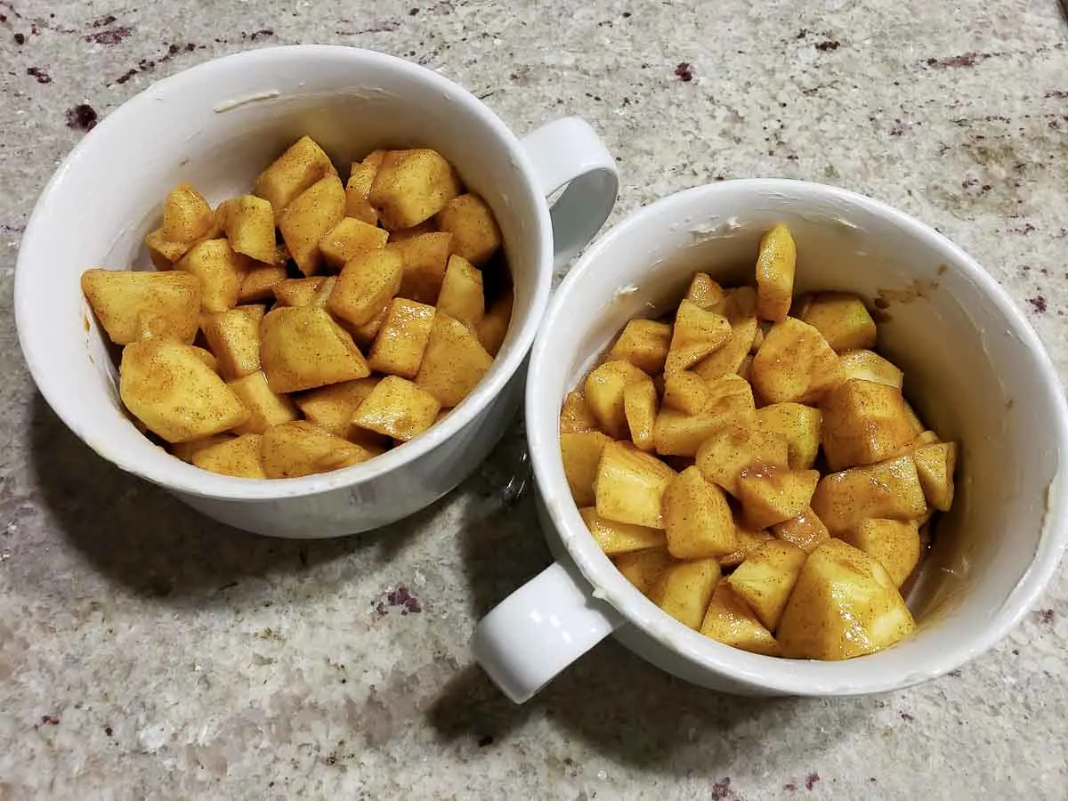 apple filling added to baking dishes.