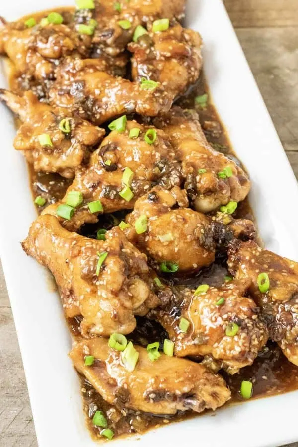a platter full of Baked Asian Sticky Chicken Wings