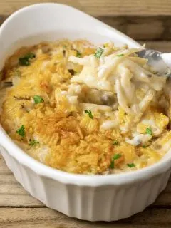 a dish filled with small batch cheesy hash brown potatoes for 2