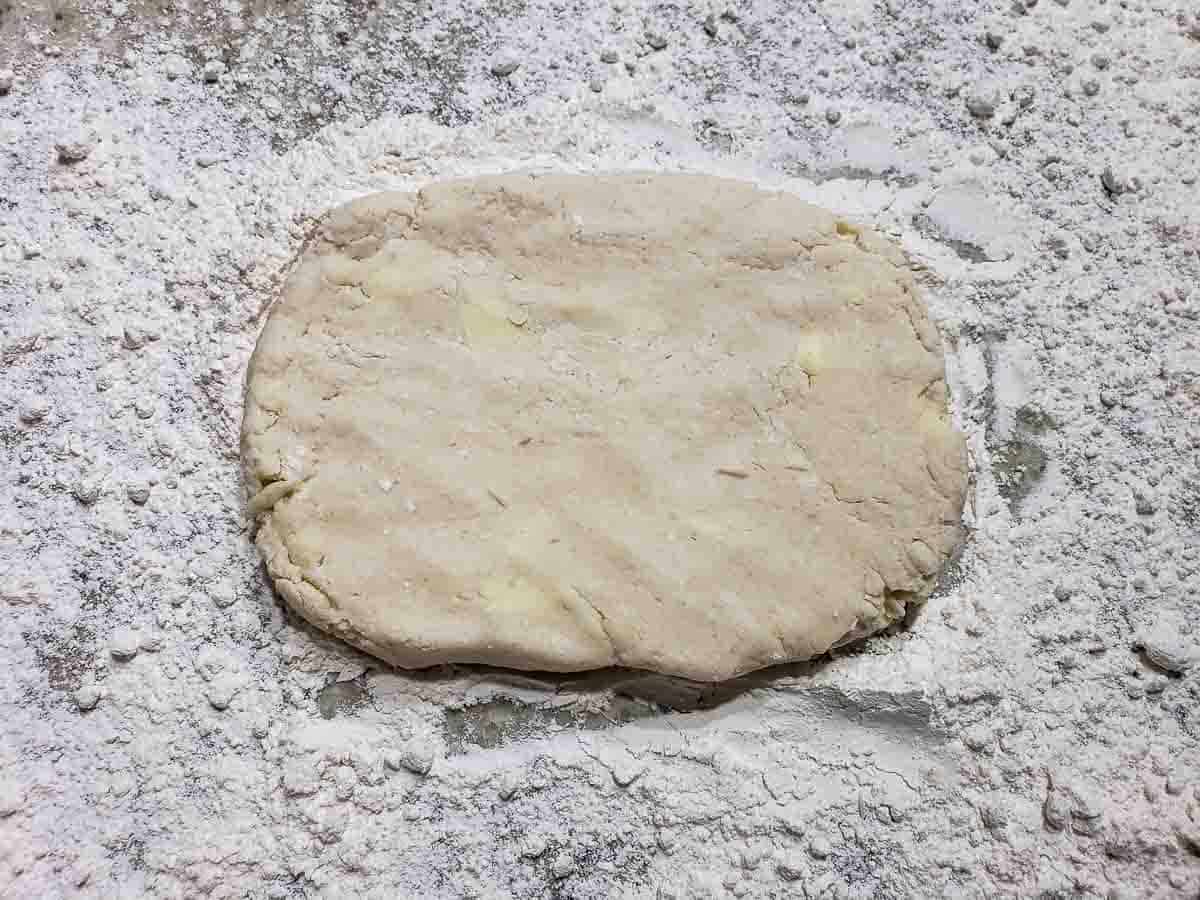 biscuit dough patted into a rectangle