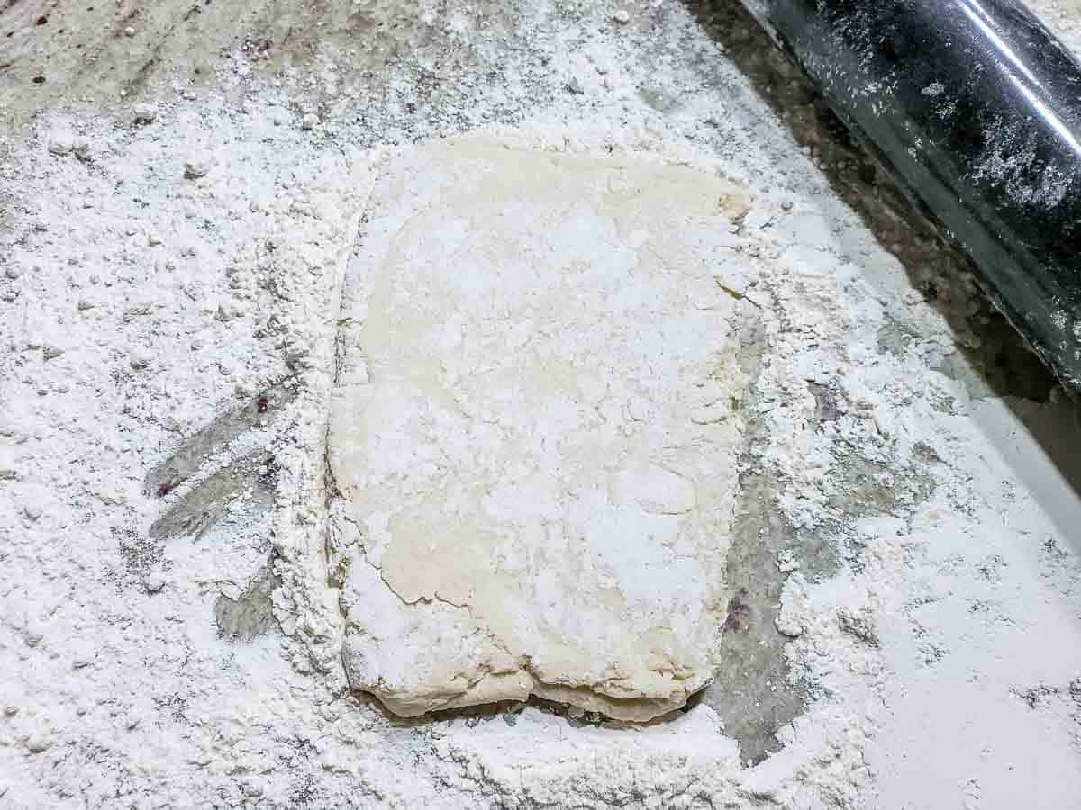 biscuit dough from scratch rolled into a rectangle
