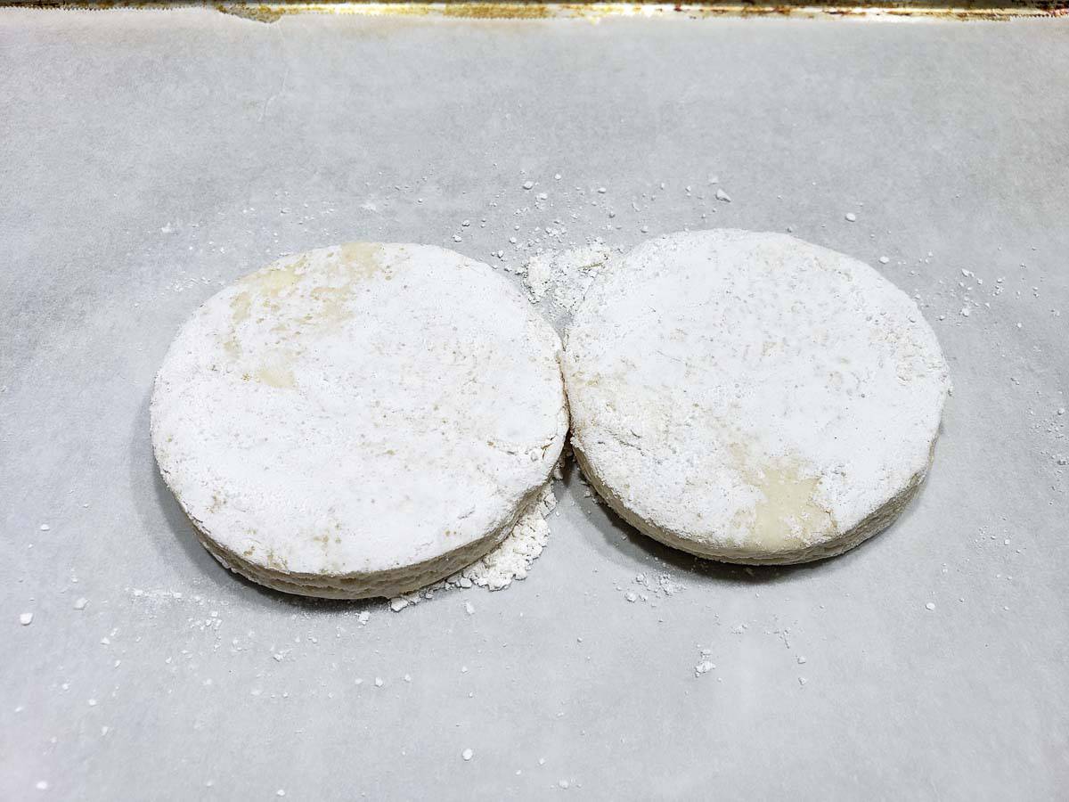 two circle biscuits from scratch on a baking sheet