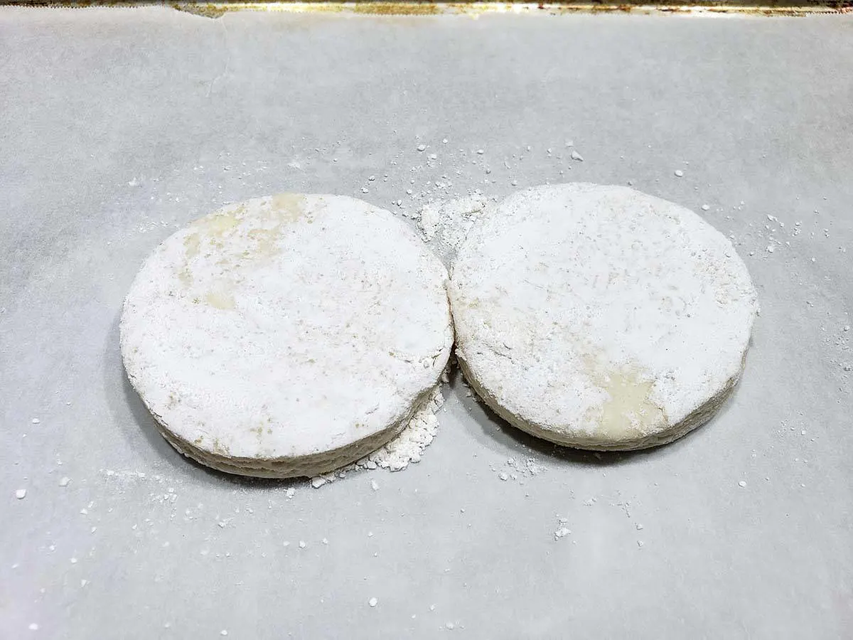 two circle biscuits from scratch on a baking sheet