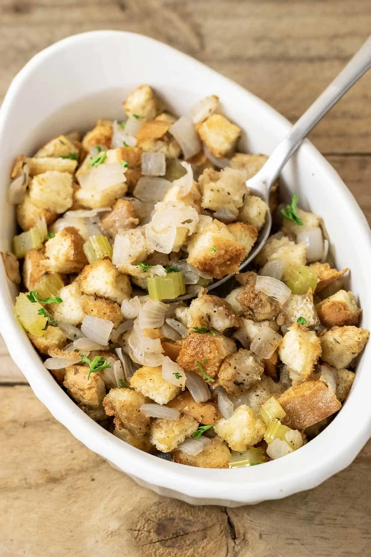 American Stuffing from scratch with a spoon lifting some out.