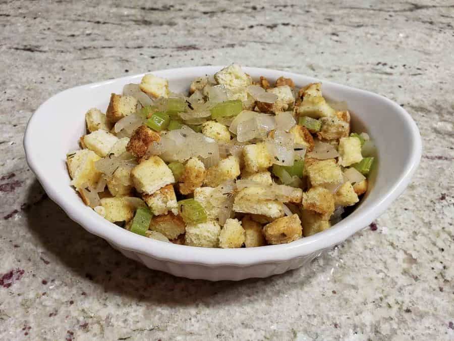 classic bread stuffing added to an oven safe baking dish.