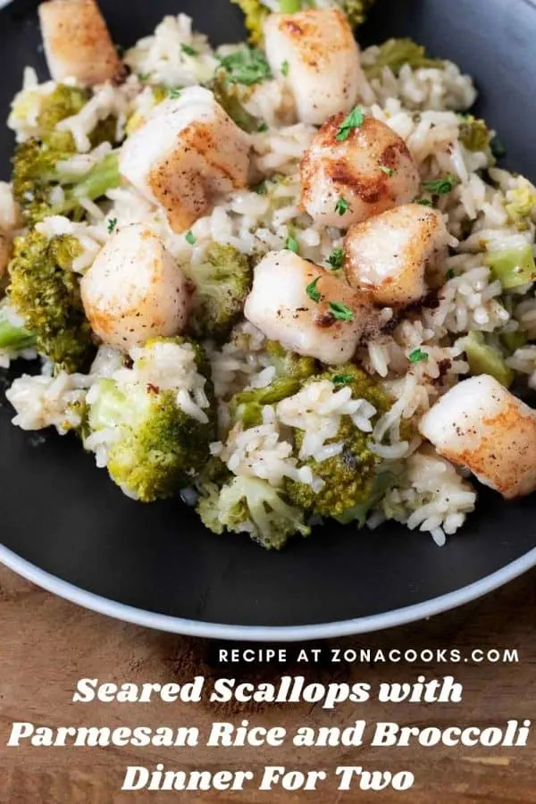 a graphic of Seared Scallops with Parmesan Rice and Broccoli Dinner For Two on a black plate.