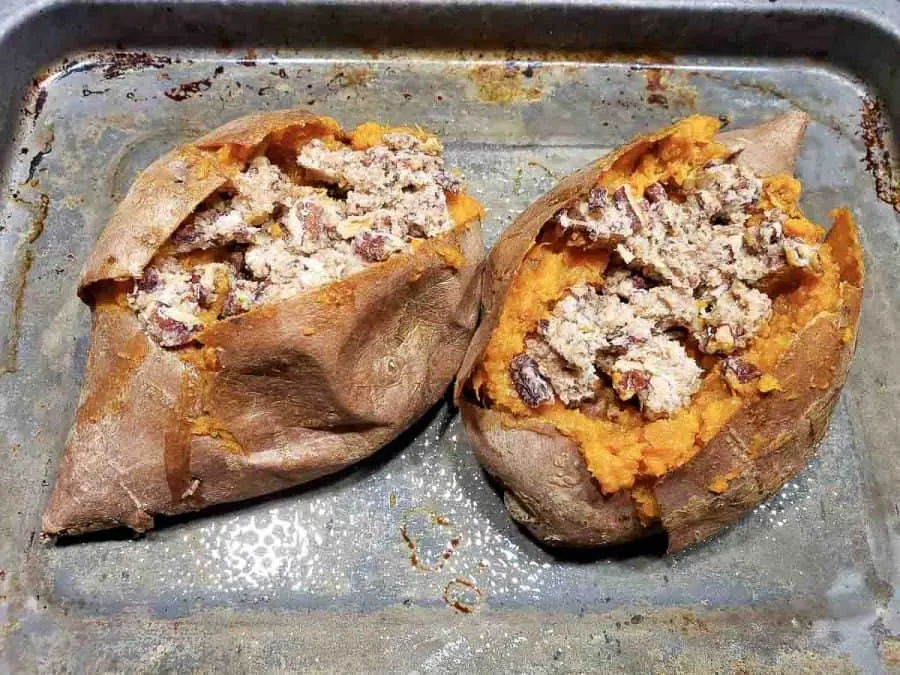 two sweet potato skins filled with brown sugar and butter pecan streusel.