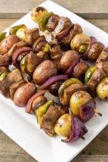 Four Easy Marinated Grilled Steak Kabobs on a platter