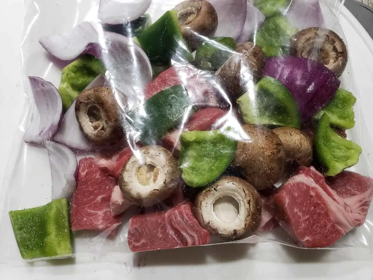 steak kabob pieces in a ziplock bag
