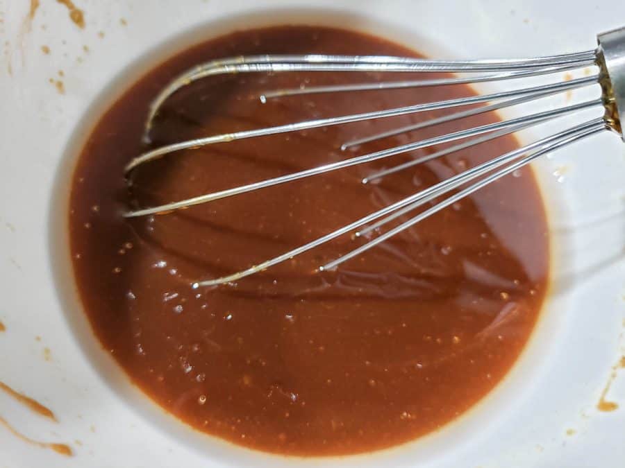 steak kabobs marinade mixed in a bowl
