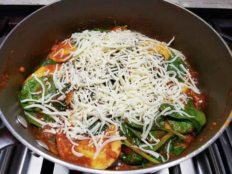 Spinach and Cheese Ravioli cooking in one pan