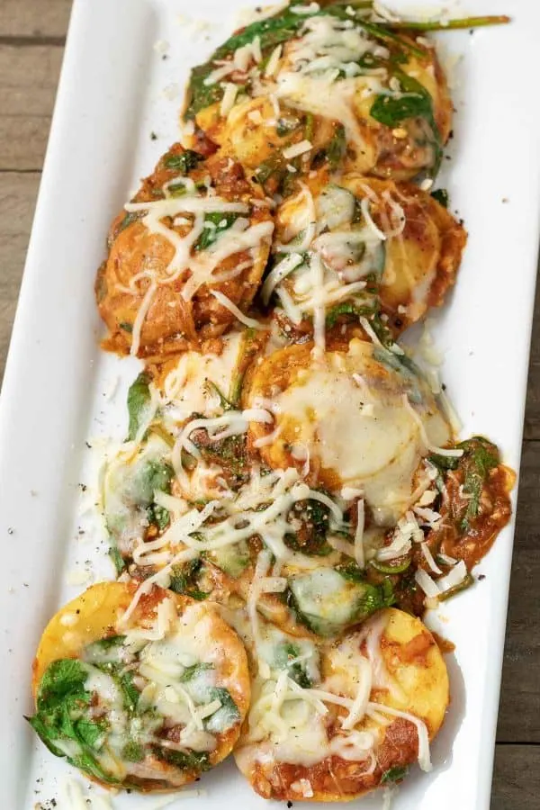 a platter filled with Easy Spinach and Cheese Ravioli