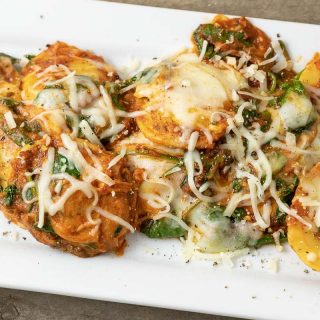 Easy Spinach and Cheese Ravioli on a white platter