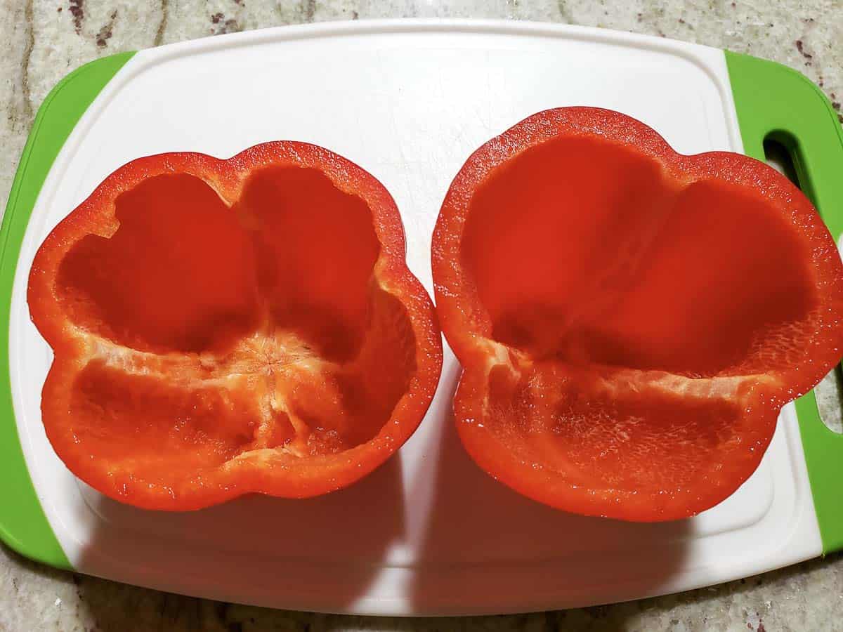 two red peppers with the seeds and membranes removed.