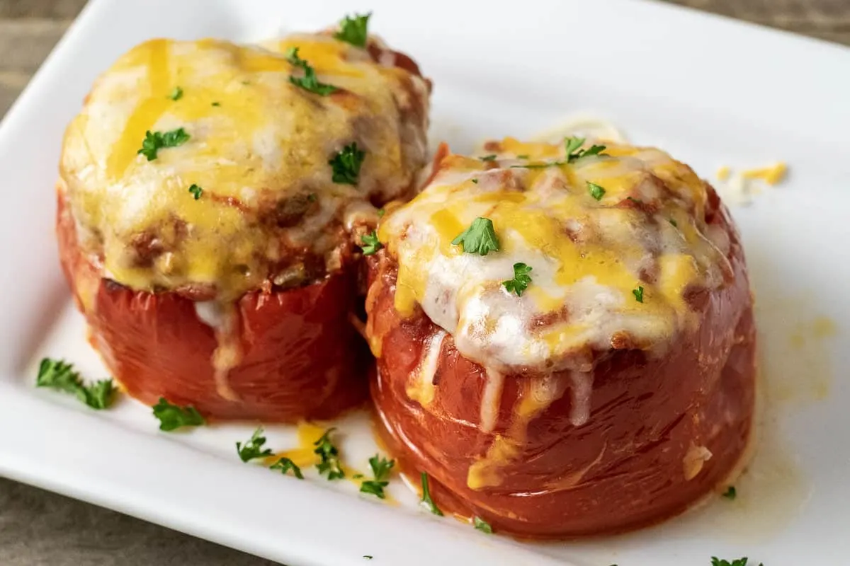 2 Slow Cooker Stuffed Peppers on a serving plate.