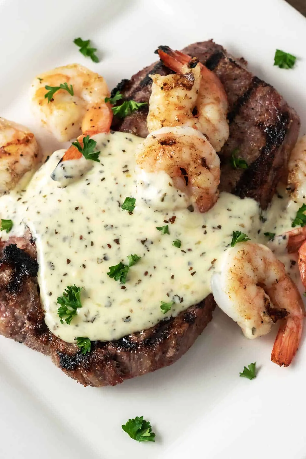 Applebee's Copycat Shrimp and Parmesan Steak on a plate.