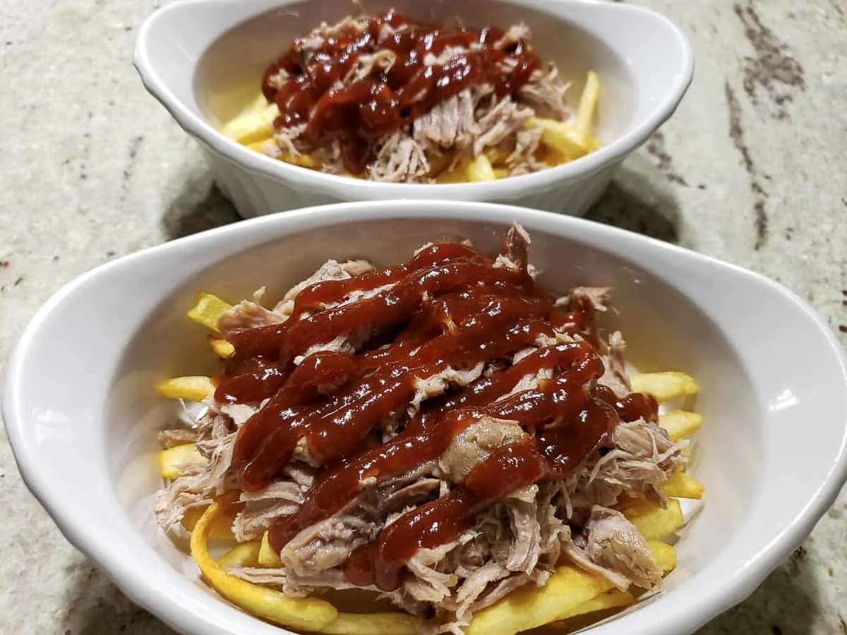 BBQ pulled pork fries in two casserole dishes