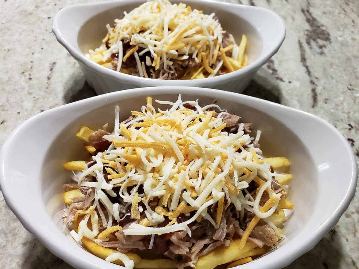 cheese added on top of BBQ pulled pork fries