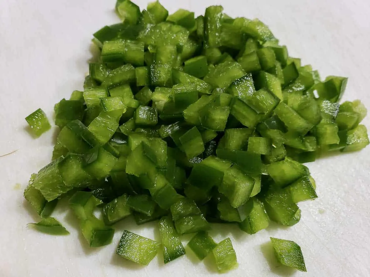 diced green pepper on a cutting board