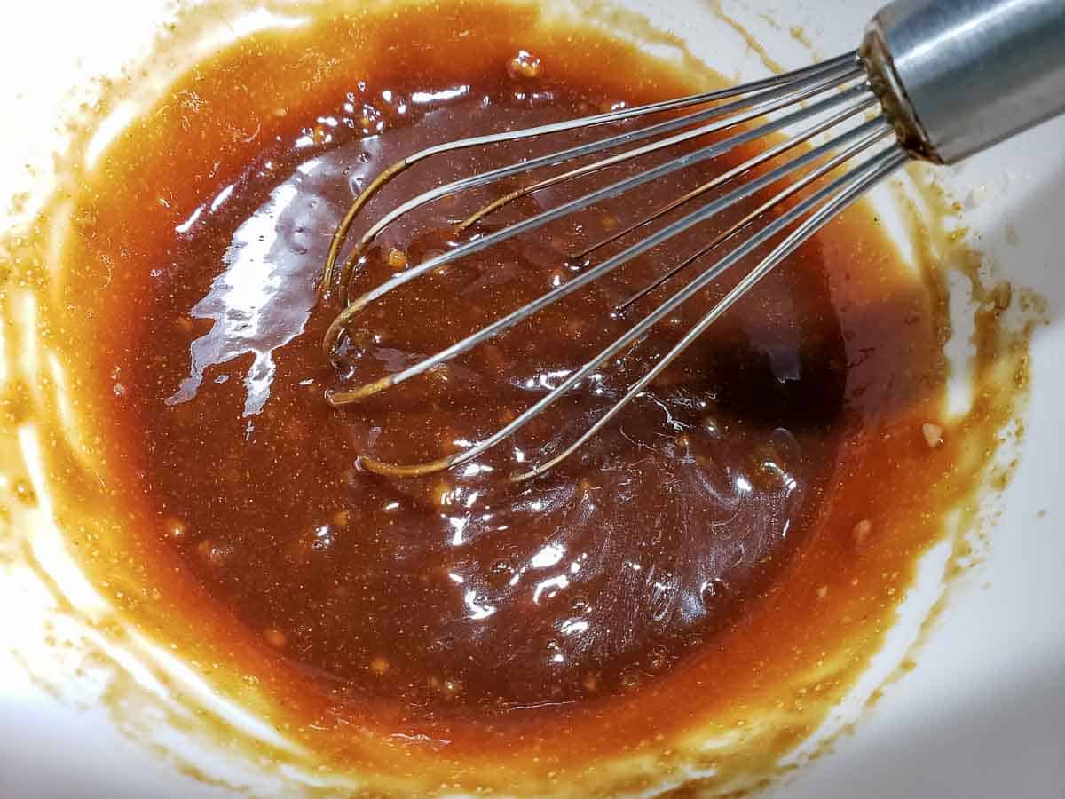 homemade Pork Cutlet Sauce whisked in a bowl.