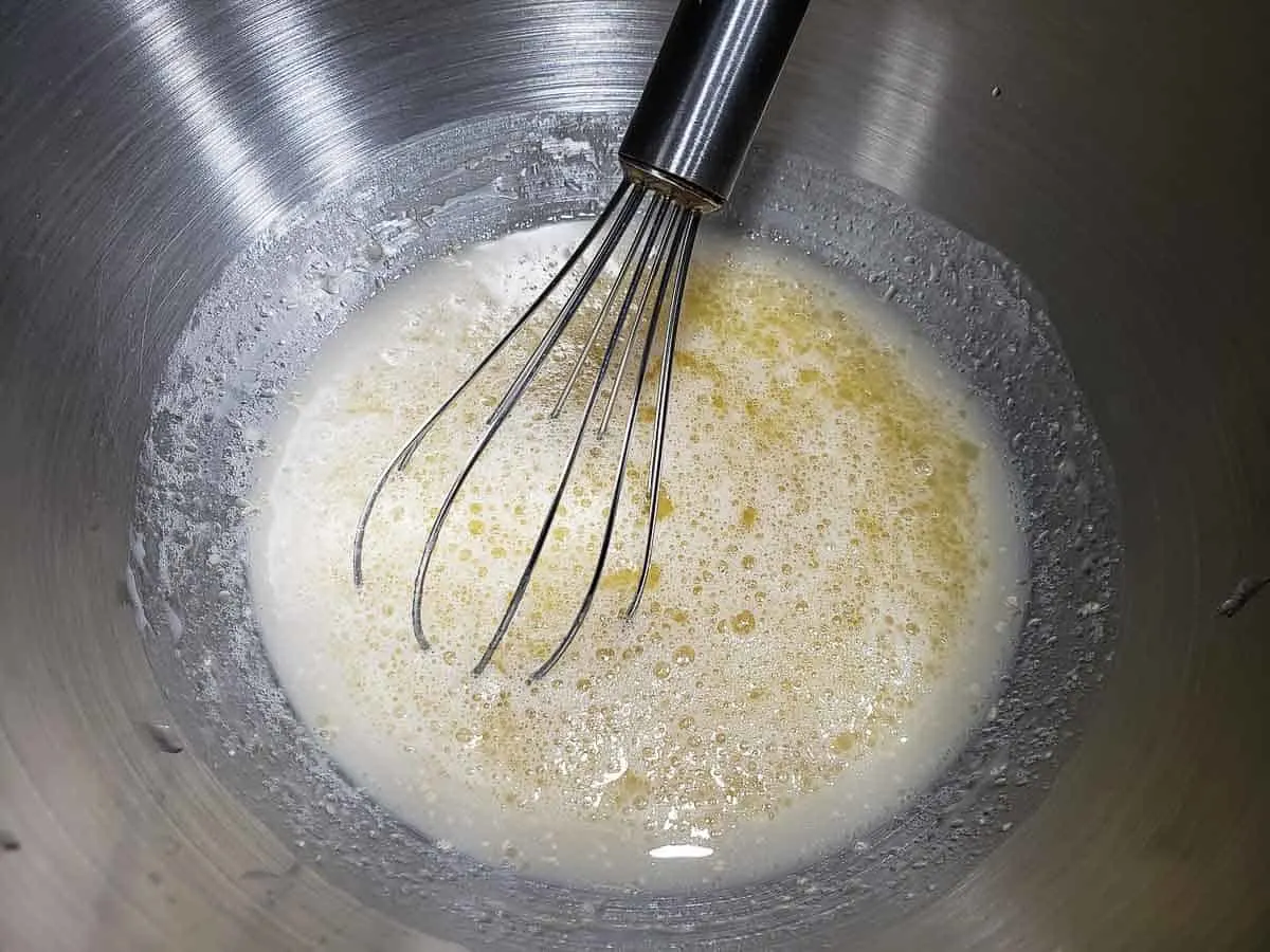butter whisked into yeast mixture.