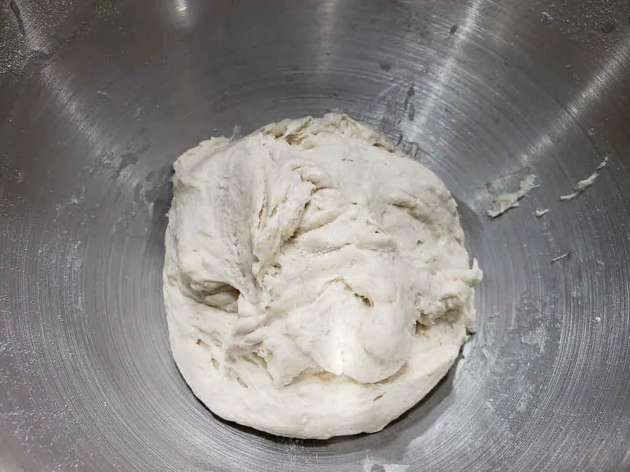 soft dough in a silver bowl