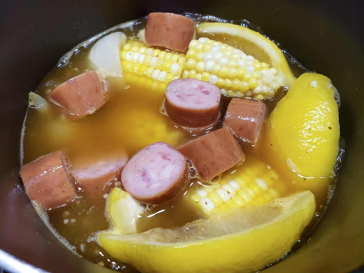 Ultimate Seafood Boil cooking in a pan.