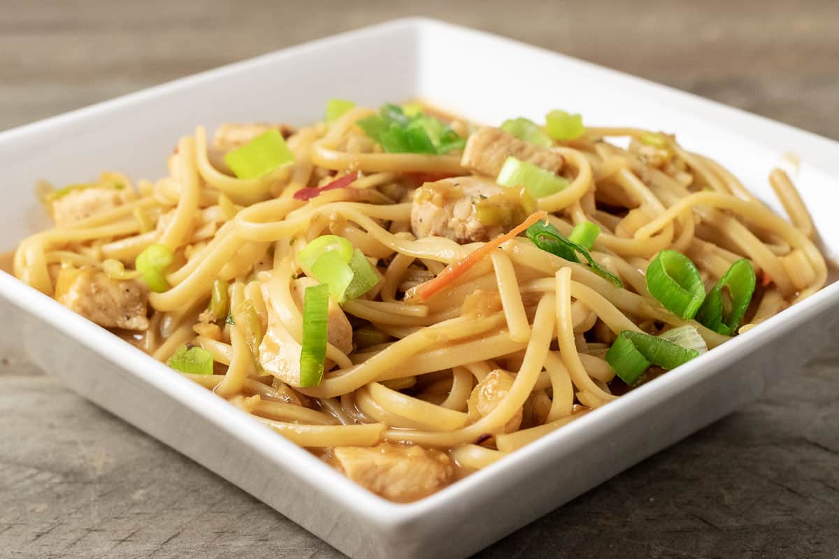 a baking dish filled with Thai Chicken Pasta.