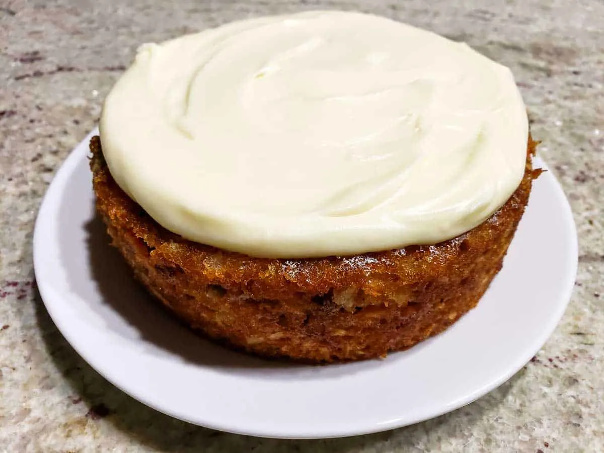 a small batch carrot cake topped with cream cheese frosting