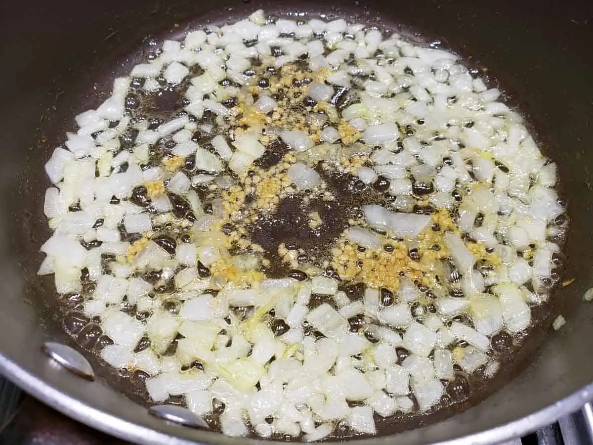 onions and garlic cooking in butter