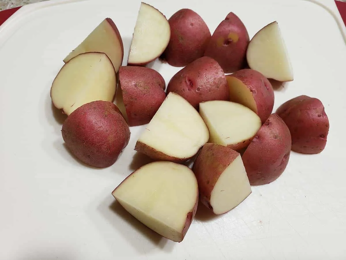 diced red potatoes on a cutting board