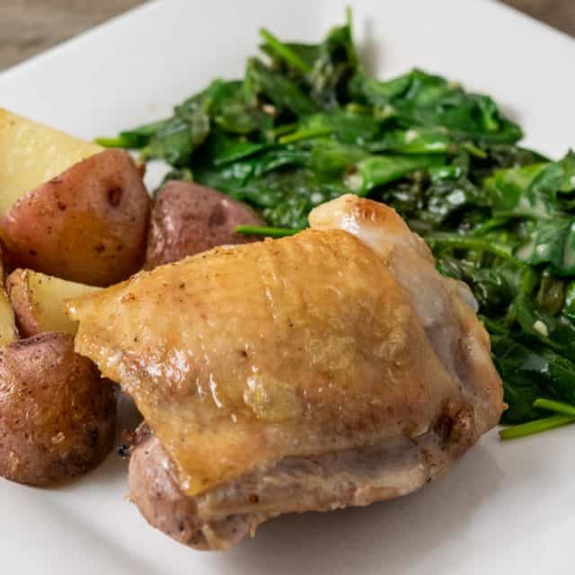 One Pan Baked Chicken Thighs with Potatoes and Carrots for Two • Zona Cooks