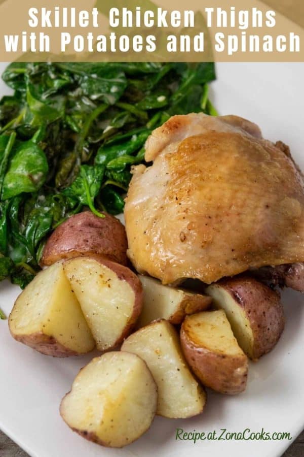 a golden brown chicken thigh with sides of red potatoes and spinach coated in sauce and text reading skillet chicken thighs with potatoes and spinach