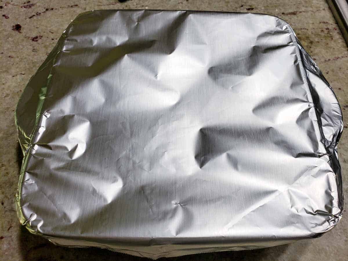 an 8x8 inch baking dish covered with aluminum foil