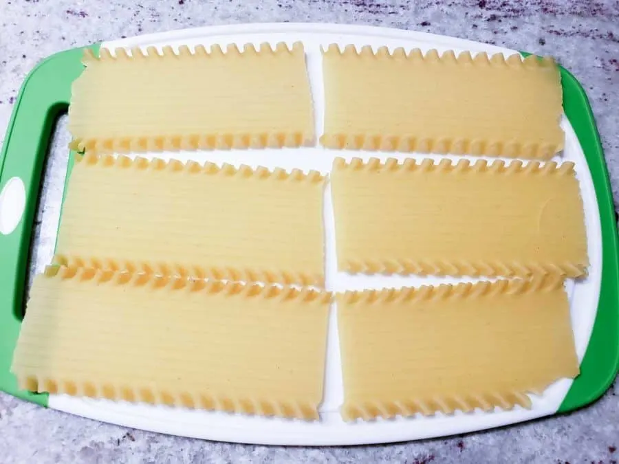 3 lasagna noodles broken in half