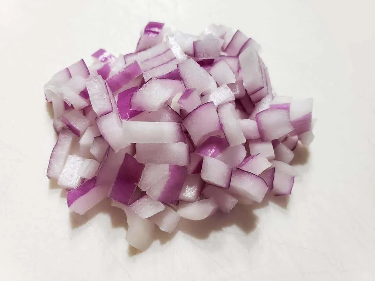 diced red onion on a cutting board