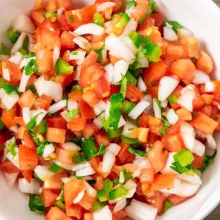 a bowl of salsa fresca pico de gallo.