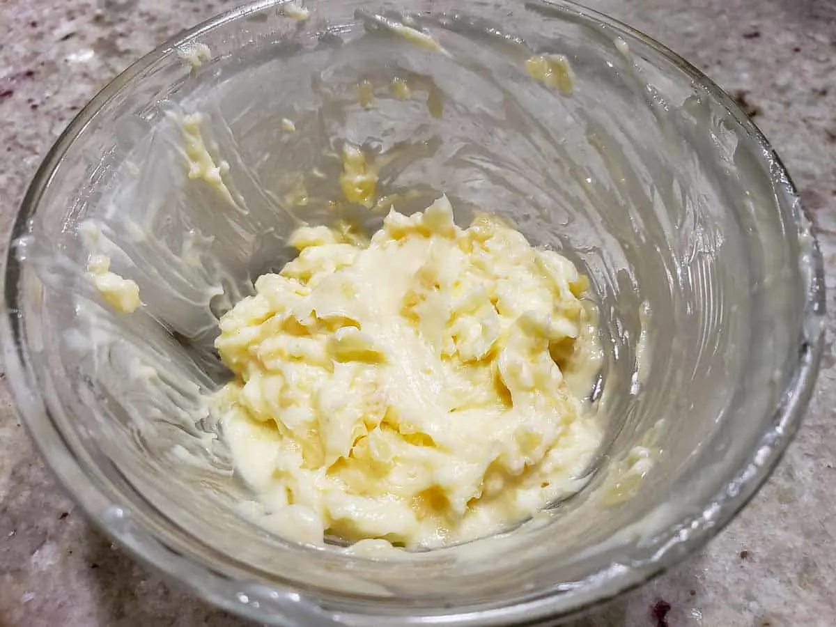 butter and garlic mixed in a bowl.