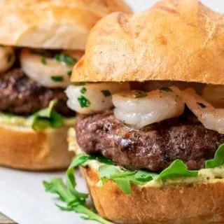 two sirloin burgers with shrimp.