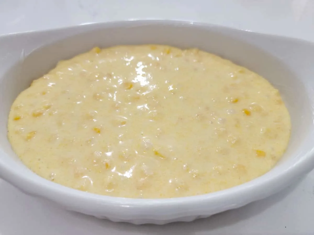 corn pudding batter in a casserole dish.