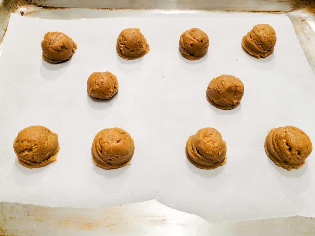 Peanut Butter Cookie balls on a baking sheet.