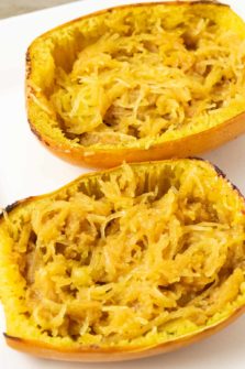 two halves of Spaghetti Squash with Brown Sugar, cinnamon, and butter.