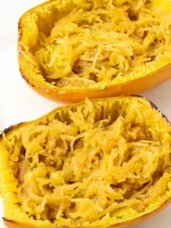 two halves of Spaghetti Squash with Brown Sugar, cinnamon, and butter.
