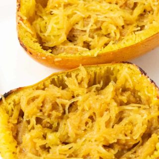 two halves of Spaghetti Squash with Brown Sugar, cinnamon, and butter.