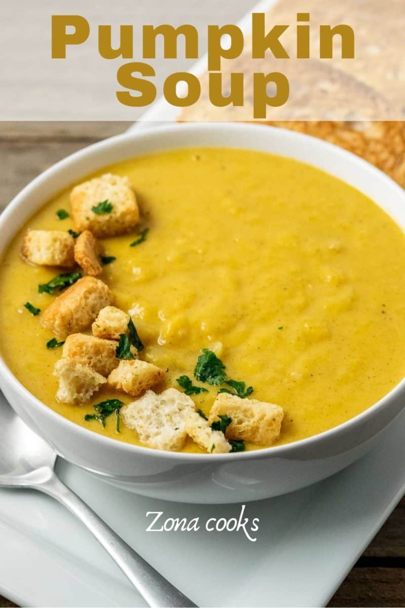a bowl filled with Pumpkin Ginger Soup.