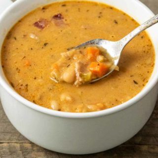 a bowl filled with White Bean Bacon Soup.