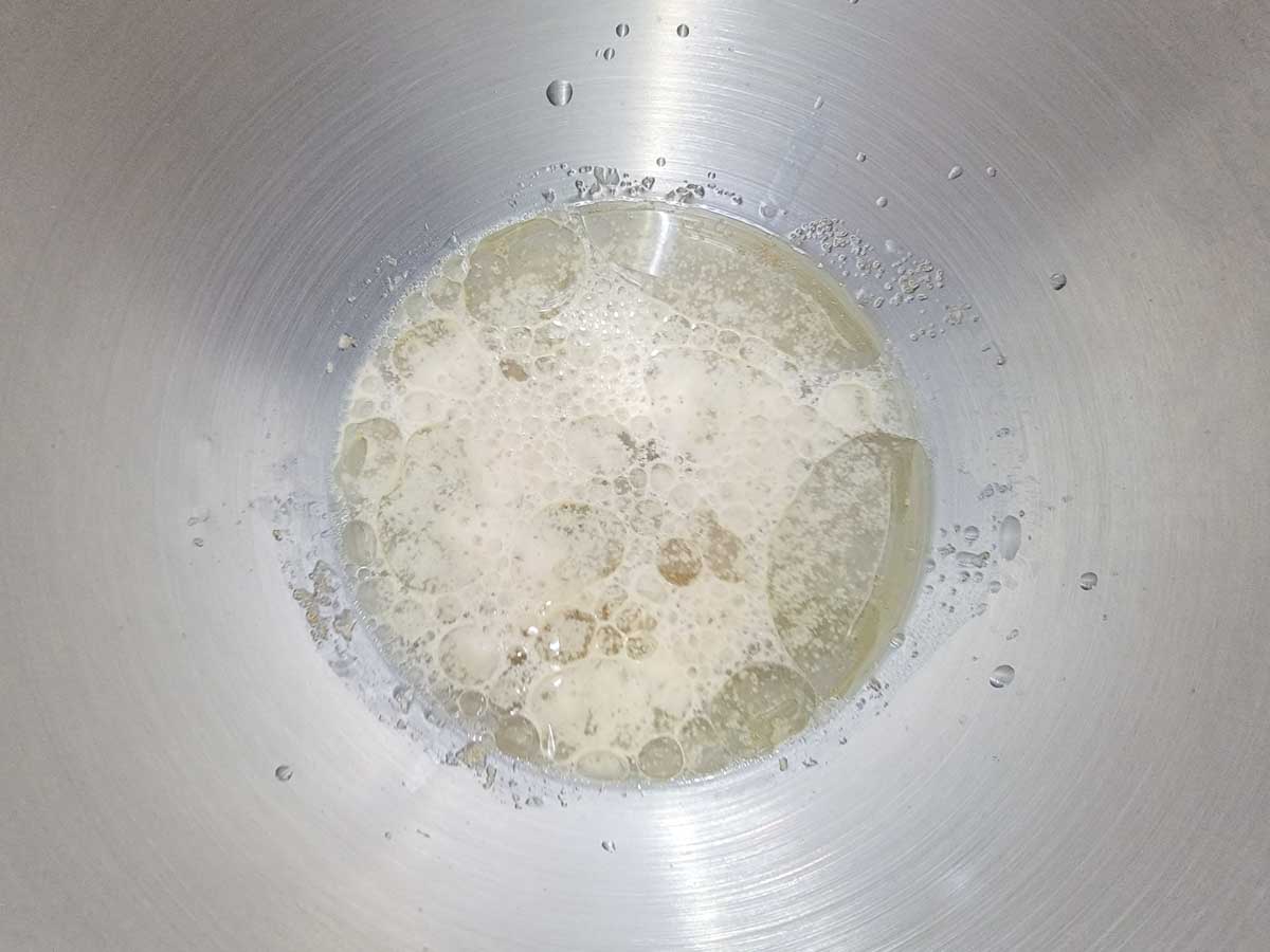 yeast activating in water, sugar, salt, and olive oil.